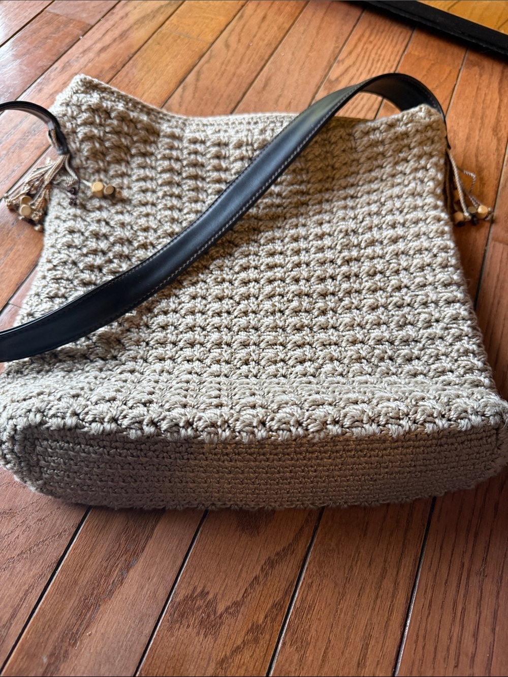 The Sak Beige Woven Crochet Shoulder Bag with Black Strap